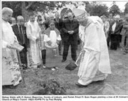 Bishop Walsh with Fr Eamon Magorrian, Curate of Lisburn, and Parish Priest Fr Sean Rogan planting a tree at St Colman's Church at Riley's Trench US23-404PM Pic by Paul Murphy