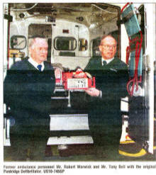 Former ambulance personnel Mr. Robert Warwick and Mr. Tony Bell with the original Pantridge Defibrillator. US10-745SP