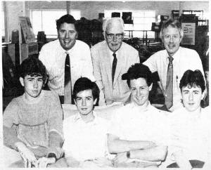 The Allen family have been serving the Lisburn public for three generations from J. C. Patterson's hardware shop. Pictured are: front row (left to right) Tony, Raymond, Geoffrey and Richard Allen and back row (left to right) Brian, Fred and Jack Allen. E 3238.