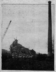 The last of the old Stewart's Mill building is demolished by the huge crane. E0433