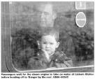 Passengers wait for the steam engine to take on water at Lisburn Station before heading off to 'Bangor by the sea'. US36-603JC