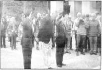 Lisburn Councillor Ned Falloon lays a wreath at the Omaha Beach memorial. US27-744SP