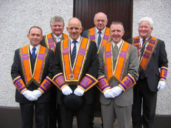 Broomhedge District officers pictured prior to the District Service at Broomhedge Parish Church last Sunday morning. L to R: (front row) William Hobson � Worshipful Master, George Beckett � Deputy District Master and Rory Faulkner � Deputy Master. (back row) Ernest Hayes � Treasurer and Past District Master, Dennis Addis � Foreman of Committee and Robert Hayes � Past District Master. Irvine Graham � Lay Reader at Magheradroll Parish, Ballynahinch, conducted the service.