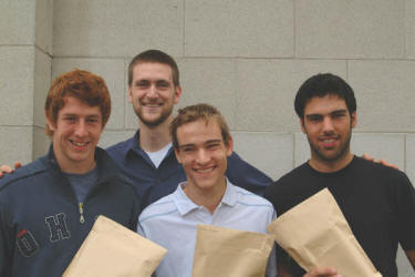Matt Craig - Youth Director at First Lisburn (second from left) is pictured after distributing Student Packs to three young members of the congregation about to start University courses. L to R: Greg Thompson, Neil Graham and Ian Robinson.