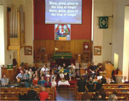 Peter Blake - Praise Band leader and Elaine Coey - Director of Music and members of the large worship group that led the hearty praise at a Family Service in St Paul�s Parish Church last Sunday morning.