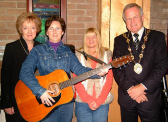 The Mayor - Councillor Trevor Lunn and the Mayoress - Mrs Laureen Lunn are pictured with Jacqueline Hagan and Donna Keating who led the praise at a service in St. Luke�s Church, Twinbrook, last Saturday evening.