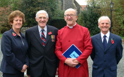 Pictured at the Remembrance Sunday Service at Eglantine Parish Church is L to R:  Roberta Cumins, Robert Cumins, Rev Canon William Bell and Noel Adams (Peoples� Glebewarden).  Robert Cumins, born in January 1921, joined the RAF in June 1940 and trained as a Flight Mechanic and worked as an Engine Fitter at Sydenham, Maghaberry, Long Kesh and Nutts Corner.  After his squadron moved to York, Robert was sent to North Africa where he was involved in the repair of Spitfires at Blida, Algeria.