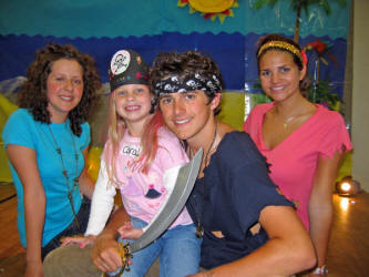 Cara Watson on holiday from Dubai pictured with Jamie Humphries during a �Crazy Hair Day� at this week�s Holiday Bible Club in Railway Street Presbyterian Church.  Included in the photo are leaders - Megan Gillespie (left) and Jordan Humphries (right).  Cara is the granddaughter of Gilbert and Vera Watson.