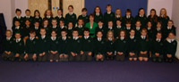 Una Tracey (conductor) pictured with St Aloysius Primary School at the Action Cancer Service of Celebration and Praise in Trinity Methodist Church on Sunday 3rd December.