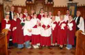 The Rev Stephen Lowry - Rector (left) the Rev Trevor McKeown - Curate (right) and David Falconer - organist (sixth from left) and Dromore Cathedral Choir pictured at a service of Nine Lessons and Carols in Dromore Cathedral last Sunday evening (17th December).