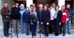 Pictured outside First Lisburn Presbyterian Church on Saturday afternoon 23rd December are members of the congregation who brought the message of Christmas in song to Lisburn City Centre shoppers at their annual �Up Front� event.