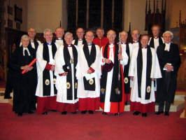 Pictured at the Service of Installation in Lisburn Cathedral on Wednesday 22nd February 2006 are L to R: (front) The Rev. Canon Edgar Turner - Registrar, the Rev. Canon Sam Wright - Treasurer, the Very Rev. John Bond - Dean of Connor, the Rev. Canon Ernest Harris - Prebendary of Cairncastle, the Rt. Rev. Alan Harper - Bishop of Connor, the Rev. Canon George Graham - Prebendary of Connor and Mr. Willoughby Wilson - Diocesan Chancellor. (back row) The Ven. Stephen McBride - Archdeacon of Connor, the Rev. Canon Percival Walker - Precentor, the Rev. Canon George Irwin - Prebendary of Kilroot, Mr. Alan Whyte - Verger, the Rev. Chancellor Stuart Lloyd - Chancellor, the Rev. Canon William Bell - Prebendary of Rasharkin and the Ven. Patrick Rooke - Archdeacon of Dalriada