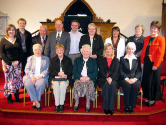 The choir from five Maze area churches that led the praise at the joint Palm Sunday evening service in Maze Presbyterian Church. L to R: (seated) Ina Coffey, Joan Kirk, Muriel Adams - Organ, Kathryn Adams and Margaret Irwin. (back row) Nicola Law - Piano, Harry McKendry, William McGeown, Richard Leathem, Robert Watson, Margaret Tolerton, Jennifer Kennedy, Maureen Hamill and Florence Leathem.
