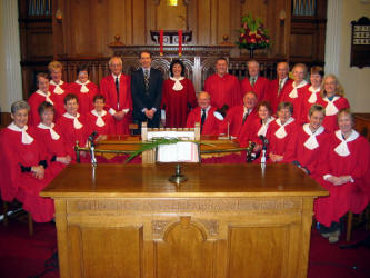 Railway Street Presbyterian Church Choir pictured at the Evening of Easter Music and Readings on Palm Sunday.  L to R: (front row) Valerie Henderson, May McConnell, Anne King, Rosemary Henderson, Jay Mateer, Billy Bittle, Laura Bittle, Anne McAllister, Pauline Adair and Julie McConaghie.  (back row) Joy Crothers, Elizabeth Menown, Dorothy McClelland, Colin McLean, Peter Wilson - Guest Organist, Janet Ferguson - Director of Music, Wilson Graham - Guest Bass, Keith Bailie, Don Mitchell, Bertha Cowan, Elizabeth Bridgett and Aileen Patterson.