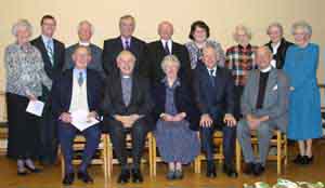 Pictured at a Farewell and Presentation Evening in Ballycairn Presbyterian Church Hall last Thursday (29th March) to mark the retirement of the Rev Victor Sinclair are L to R: (seated) William Steele - Clerk of Session, Rev Victor Sinclair, Mrs Maje Sinclair, Victor Sinclair (jnr) and Rev Cowper Lynas - Convenor of Ballycairn vacancy (1975). (back row) Mrs Elizabeth Walker - Vice President of the PWA, Paul McCarroll - RBP 116 and LOL 1933, Rev Canon John Bell - former Rector of Drumbo, Rev Trevor Anderson - Clerk of South Belfast Presbytery, William Clarke, Miss Gillian McBride, Mrs Anne Gowdy, Mrs Edith Douglas and Miss Joy Rainey. Unable to attend was Mr and Mrs Sinclair's son Kenneth, their daughter-in-law Rebecca and grandchildren Megan and Kenneth. Kenneth is currently a Presbyterian Minister in America.