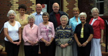 Sylvia Creighton - choir secretary (front left) and members of Christ Church Choir who served a delightful lunch prior to the 'Music in May' concert in Christ Church Parish on Tuesday 15th May.