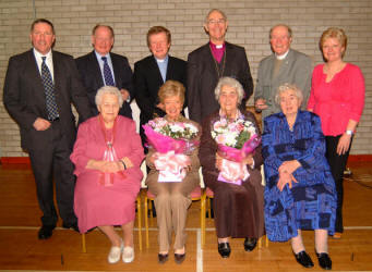 Pictured at a dinner in Magheragall Parish Church Hall last Wednesday afternoon (31st January) to mark the 20th anniversary of the Senior Citizens' Club are: (seated) Elizabeth Hill, Maureen Cheevers, Kitty McCluskey and Annie Maginnis.  (back row) Bobby Cunningham, Rev Raymond McKnight, Rev Nicholas Dark, Rt Rev Alan Harper - Bishop of Connor, Rev Canon Alec Cheevers and Sharon Cunningham.