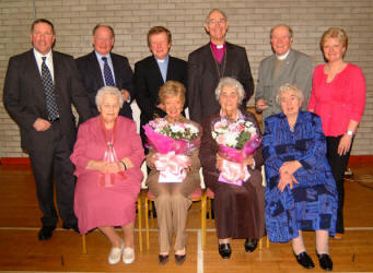 Pictured at a dinner in Magheragall Parish Church Hall last Wednesday afternoon (31st January) to mark the 20th anniversary of the Senior Citizens' Club are: (seated) Elizabeth Hill, Maureen Cheevers, Kitty McCluskey and Annie Maginnis. (back row) Bobby Cunningham, Rev Raymond McKnight, Rev Nicholas Dark, Rt Rev Alan Harper - Bishop of Connor, Rev Canon Alec Cheevers and Sharon Cunningham.