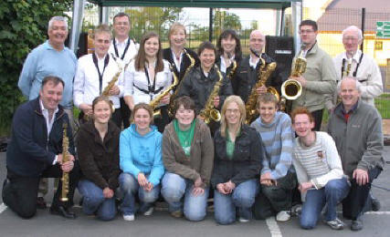 Victor Currie - Musical Director (left in front row) and Lisburn Saxophone Ensemble provided the musical entertainment at a fundraising Barbeque at Hillsborough Presbyterian Church last Friday evening (25th May). Included in the photo are the minister, the Rev John Davey (left in back row) and members of the Young Adults Group (YAG) who organised the event.