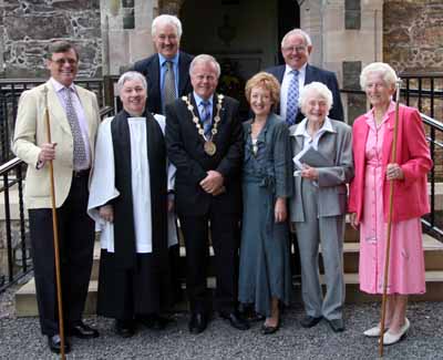 L to R: Roddy Oliver - Rector's Church Warden, Rev Raymond Devenney - Rector, Councillor Trevor Lunn - Mayor, Mrs Laureen Lunn - Mayoress, Beryl Dean - President of Drumbeg Residents' Association and Helen Smyth - People's Church Warden. (back row) John Mullan - Bryson Charitable Group) and Hugh Crookshanks - Chairman of Drumbeg Residents' Association.