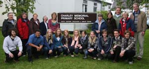 Rev Raymond Devenney (Rector of Drumbeg Parish), Pauline McKee, Anne Pollock (supervisory assistants), Lilian McGlade (caretaker) and Joy Lewis (former secretary) and some of the parents and past pupils that attended the BBQ in Charley Memorial Primary School last Friday night. 