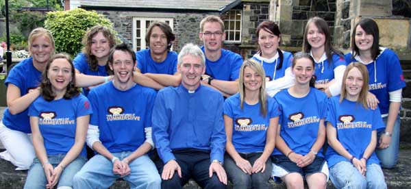 The Rev Canon Sam Wright pictured with the Youth for Christ Summerserve team at morning worship in Lisburn Cathedral on Sunday 22nd July. L to R: (front row) Rachel Sheppard (Ballymena), Craig Hutton (Lisburn Cathedral), the Rev Canon Sam Wright, Zara Wortley (Lisburn Cathedral) and Ashleigh Hamilton and Squeak Miskelly (Newtownards). (back row) Dani Almquist, Erica Horton and Benn Conn (America), Andreas Trinks (Germany), Kara McLean and Charlotte Lamont (Antrim) and Gemma Barclay (Whitehead).