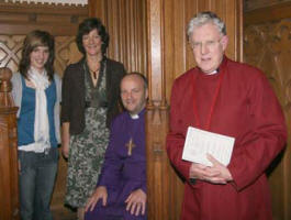 The new Bishop of Connor, The Rt Rev Alan Abernethy pictured with his wife Liz and daughter Ruth, after his Enthronement. Looking on is the Dean of Connor, the Very Rev John Bond.