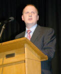 Pastor Robert Murdock pictured giving an emotional address at his Farewell Service in Wallace High School on Friday 30th November.