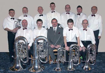 Gary Shields (conductor) and Aughnaskeogh Silver Band pictured at the Lower Iveagh Evangelical Concern Carol Service in Dromore Orange Hall last Monday evening (10th December).