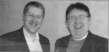 Jonathan Rea who conducts the New Irish Choir and Orchestra, with his lather Rev Harry Rea.