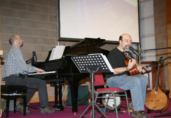 Michael Card (right) on stage with Jeff Taylor in Trinity Methodist Church last Thursday evening (17th April).