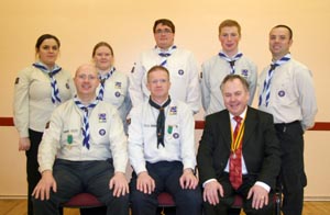 L to R: (seated) Paul Clydesdale (Group Scout Leader), Noel Irwin (District Commissioner) and Harold Baird (Founder GSL). (back row) Kelly Ann Aldridge, Sarah Jane Heaney, Brian Fair, William Heaney and Craig Adams.