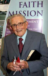 Wesley Campbell pictured with the two Royal Maundy purses.