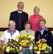 L to R: (seated) Margaret Benson, Marion Johnston (former Brown Owl) and Irene Bethel. (back row) The Rev John Budd (Rector) and Trudy Hull (Chairperson of Derriaghy Youth Council).