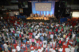 Ian Hannah (Musical Director) and his team of talented musicians and vocalists pictured leading the lively praise backed by over 4,500 young people who packed the King�s Hall for morning worship at Summer Madness.