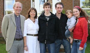 Rev Clive Webster pictured at the Broomhedge manse with his wife Lesley, sons Stuart and Ross, daughter-in-law Laura and grandson Joshua. (Unfortunately sons Lee, Scott and Ian were unable to be present).