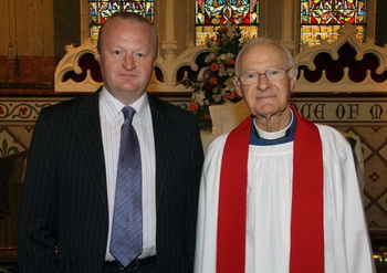 Rev Canon Dr Ken Cochrane pictured with his son Michael.