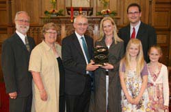 Gordon Lindsay (Clerk of Session) presents a gift to Judith Hamilton (Architects Knox and Markwell) in recognition of services over and above the call of duty. Looking on are Judith�s parents Brian and Evelyn Knox (left) and her husband Stuart and family.