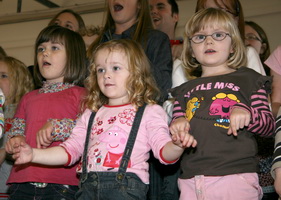 Sunday School children Harmonie Ferguson, Anna Dundas and Sarah Littler pictured singing 'Thankyou Lord' at a lunch served in the church hall following the Harvest Thanksgiving Services in Christ Church Parish last Sunday morning (5th October).