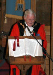 The Rt Worshipful the Mayor, Councillor Ronnie Crawford reading the first Scripture lesson.