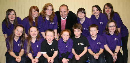 John Steen, Chairman of Derriaghy Parish Social and Fundraising Committee pictured with the talented young parishioners from Derriaghy Parish who took part in �Songs from the Shows� at the Parish Centre last Saturday evening (29th November). 