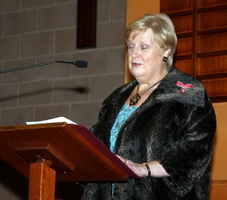 Norma Bell MBE, Chairperson of the Lisburn Action Cancer Group welcomes the large congregation.