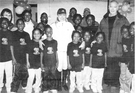 Ugandan orphans who visited Saintfield last year with Joan Cunningham who organised a charity pleasure ride, lunch and auction which raised '5,000 for the children's health and educational needs. Also included are Ian and Phyllis Hasson from Rock Ministries (NJ.) Trust.