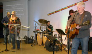 The worship team leading the lively celebratory praise. 