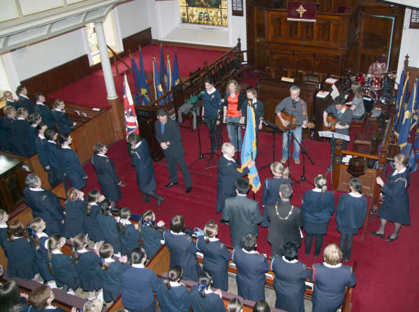 First Lisburn Presbyterian Church praise band pictured singing ‘We want to see Jesus lifted high’ during the receiving of the colours.