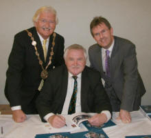 John signs copies of his book for Lisburn Mayor Councillor Ronnie Crawford and Lagan Valley MP Jeffrey Donaldson MLA in recognition of their help, support and encouragement during the compilation of the book.