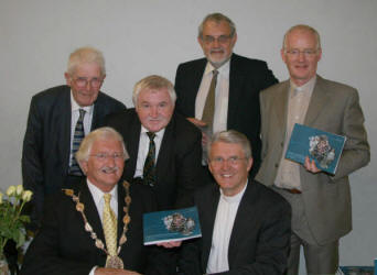 John shows a copy of his book to Councillor Ronnie Crawford (Lisburn Mayor) and The Rt Rev Stafford Carson (Presbyterian Moderator). Looking on are L to R: Victor Hamilton (grandson of the late Very Rev Dr R W Hamilton), Rev Dr Bert Tosh (Senior Producer of Religious Programmes, BBC Northern Ireland) and Rev Brian Gibson (Minister of Railway Street Presbyterian Church). 
