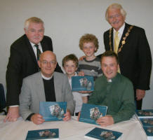 Former rector of Drumcree, the Rev John Pickering (left) and Christ Church (Lisburn) Rector, the Rev Paul Dundas and his sons Joel and Curtis pictured at the book launch with John Kelly and Lisburn Mayor Councillor Ronnie Crawford.