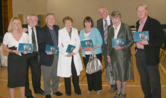 Posing for a family photo at the book launch are L to R: Emma Kelly, John Kelly, Gilbert and Vera Watson, Mary Kelly, Allen and Marjorie Cushnie and George Kelly. 