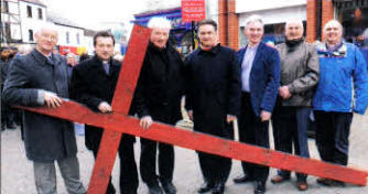 City Centre Ministers prior to the Good Friday 'Carrying of the Cross March of Witness' in Lisburn. L to t: Rev Brian Gibson (Railway Street), Rev Paul Dundas (Christ Church), Fr Dermot McCaughan (St Patrick's), Rev John Brackenridge (First Lisburn), Rev Canon Sam Wright (Lisburn Cathedral), Pastor Zeorge Hilary (Lisburn Christian Fellowship) and Rev Brian Anderson (Seymour Street Methodist)